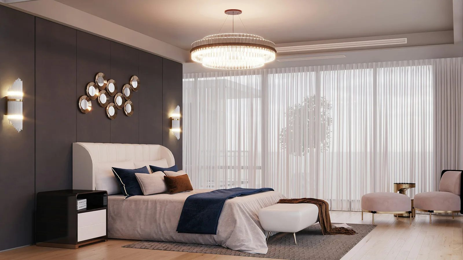 A softly lit primary bedroom with a tufted headboard and a crystal chandelier